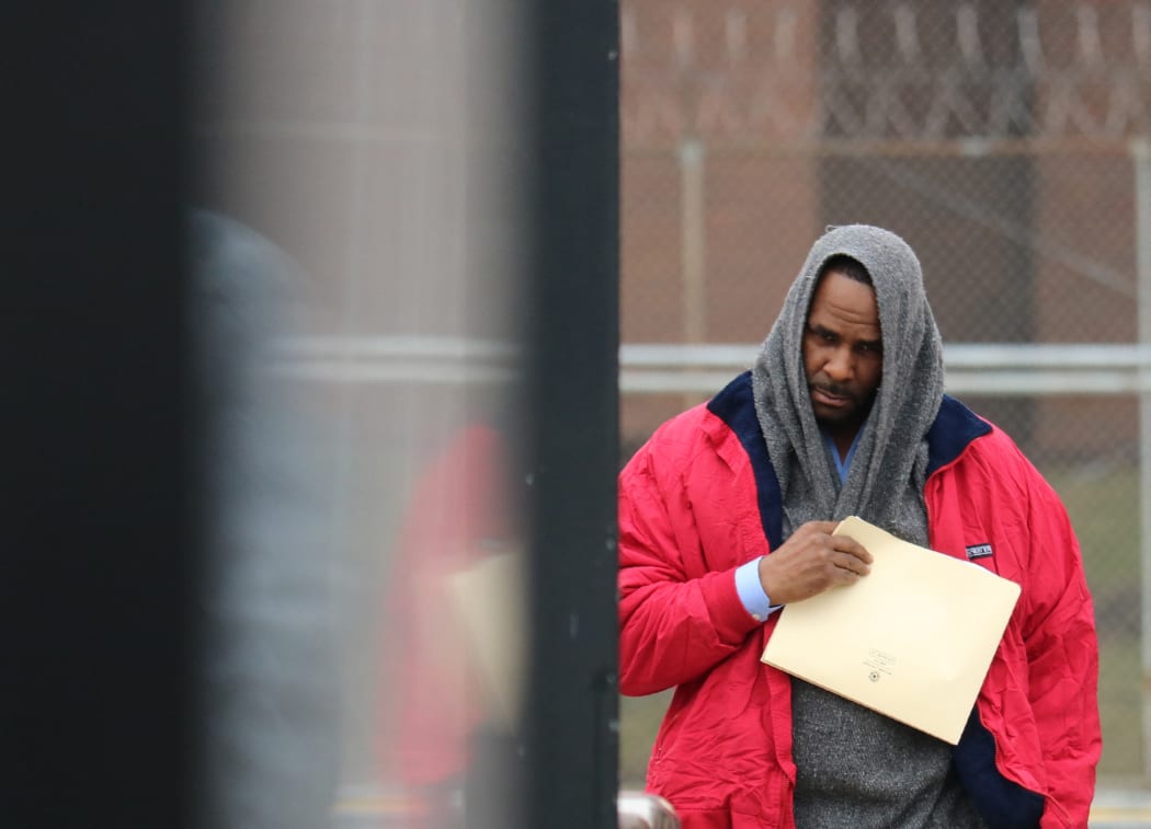 R. Kelly leaves after being freed from Cook County jail in Chicago, Illinois in March 2019.