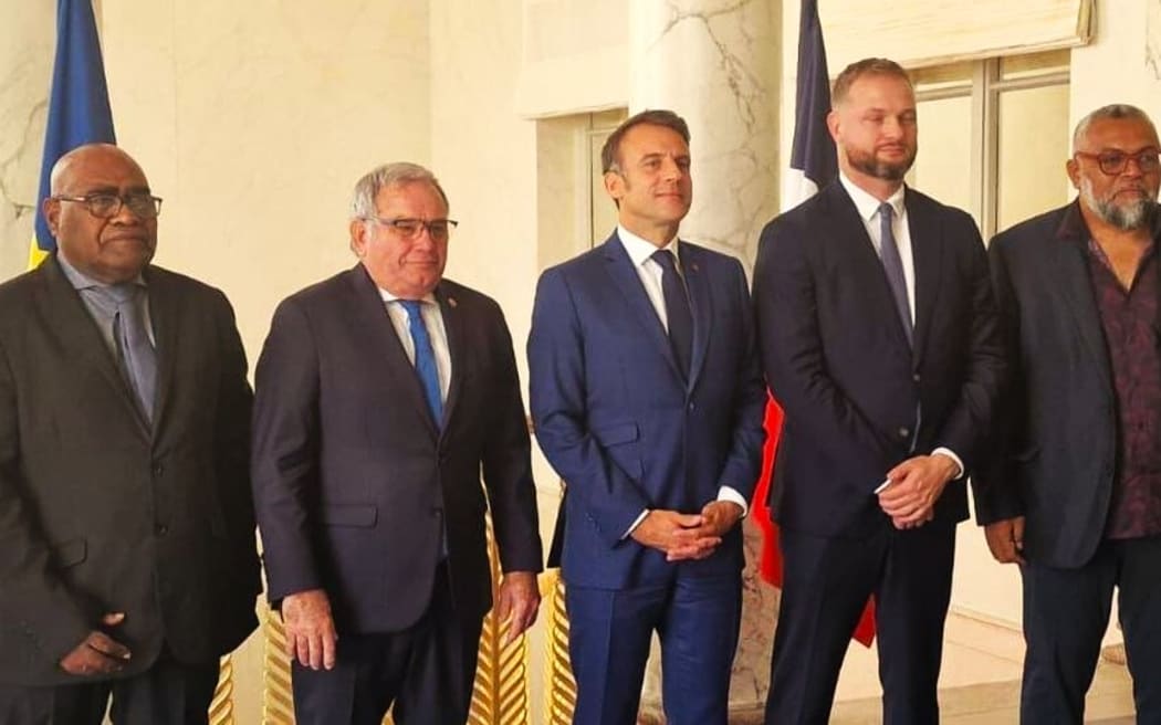 New Caledonia's four MPs Emmanuel Tjibaou, Nicolas Metzdorf, Georges Naturel and Robert Xowie with French President Emmanuel Macron on Thursday 25 July 2024