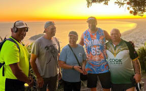 Damian Bennett, Brendon Taingahue, Lee Taingahue, Mr G and Ernie Syndey at the summit of Mauao at the start of Mauaoathon for Māori ward councillor Mikaere Sydney.