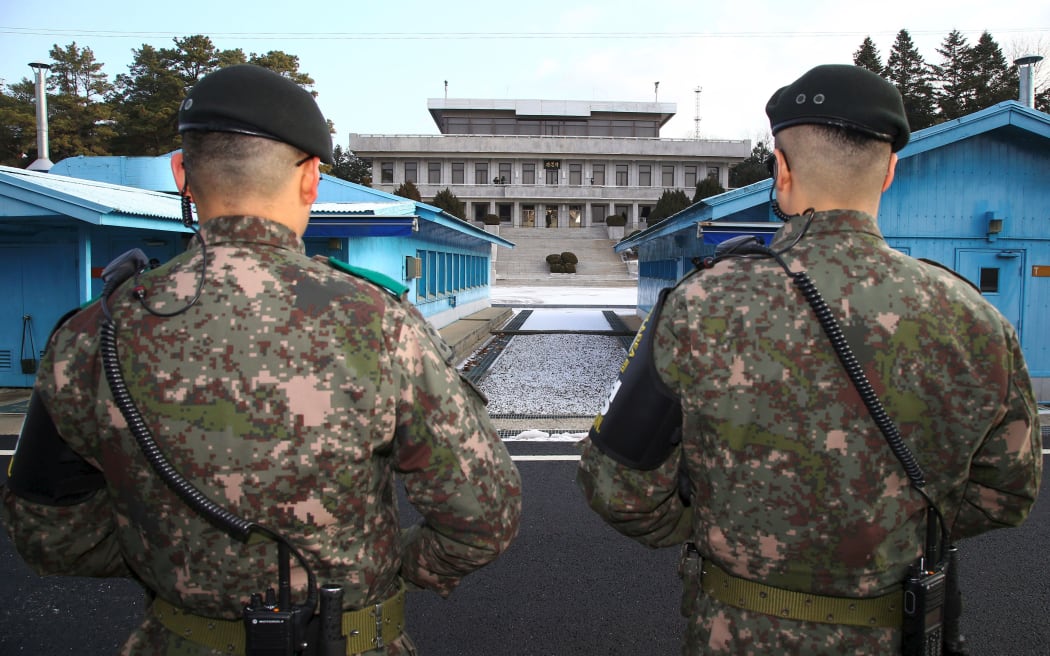 South Korean soldiers stand guard at the border truce village of Panmunjom dividing the two Koreas.