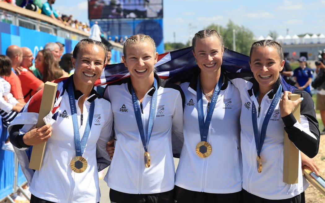Olivia Brett, Dame Lisa Carrington, Alicia Hoskin, Tara Vaughan from New Zealand win gold in the women’s four final. Paris 2024.