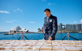 GWR Adjudicator Brian Sobel inspecting the world's longest line of sandwiches