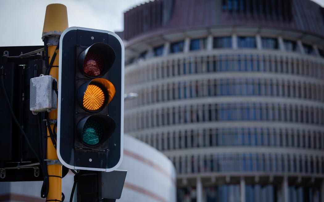Orange Traffic Light in front of Parliament