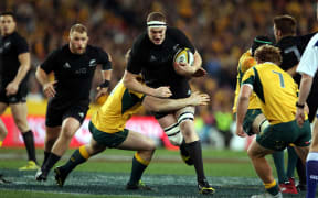 Brodie Retallick charges at the defence in the Test between the All Blacks and the Wallabies.