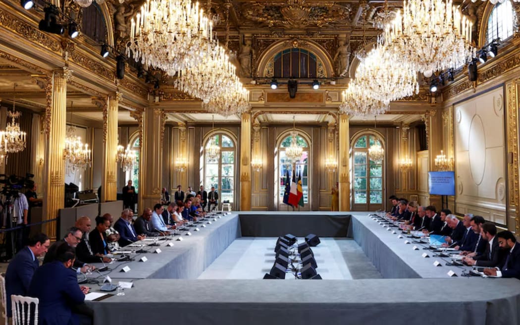 French officials met with New Caledonian representatives in Paris to negotiate an agreement on the territory's status. (AP)