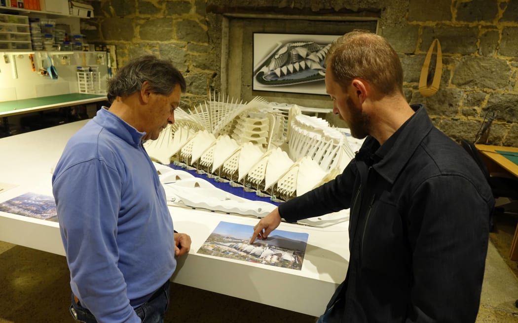 Mr Taylor and Mr van Brandenburg look at the progress of another of Mr van Brandenburg’s ambitious projects – Marisfrolg Headquarters in China. Mr Taylor says such projects shows the vision for Dunedin’s harbourside is not just a pipedream.