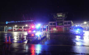 Ambulances are seen at the airport where a London-Singapore flight that encountered severe turbulence was diverted to, in Bangkok, Thailand, Tuesday, May 21, 2024. The plane apparently plummeted for a number of minutes before it was diverted to Bangkok, where emergency crews rushed to help injured passengers amid stormy weather, Singapore Airlines said Tuesday. (AP Photo/Sakchai Lalit)