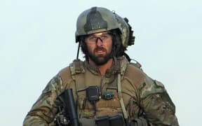 Jamie Pennell at the end of a military operation against Taliban militants who had stormed the Intercontinental Hotel in Kabul on June 29, 2011.