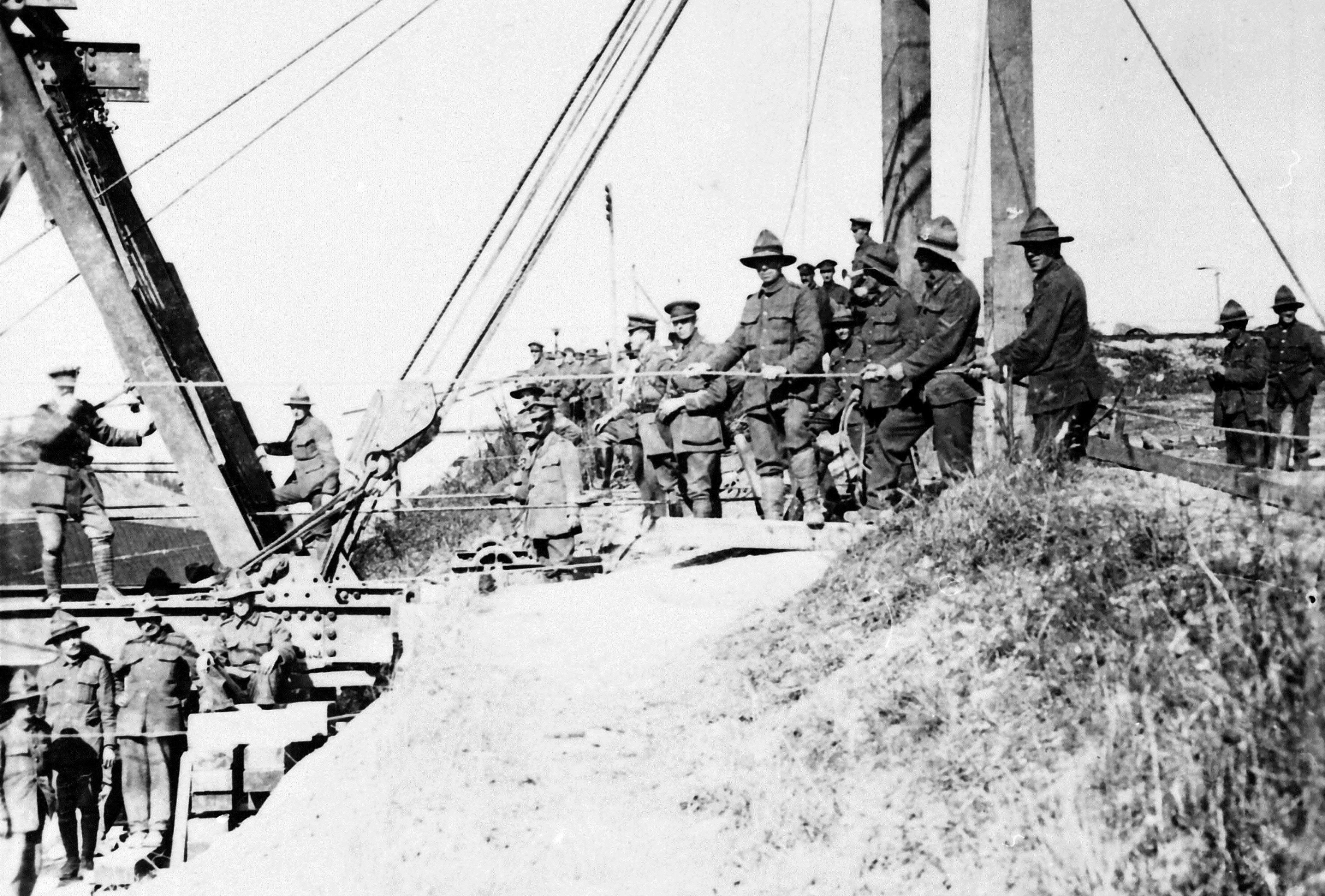 Tunnellers above ground, working as engineers erecting a bridge at Havrincourt over Canal du Nord on 26 September 1918