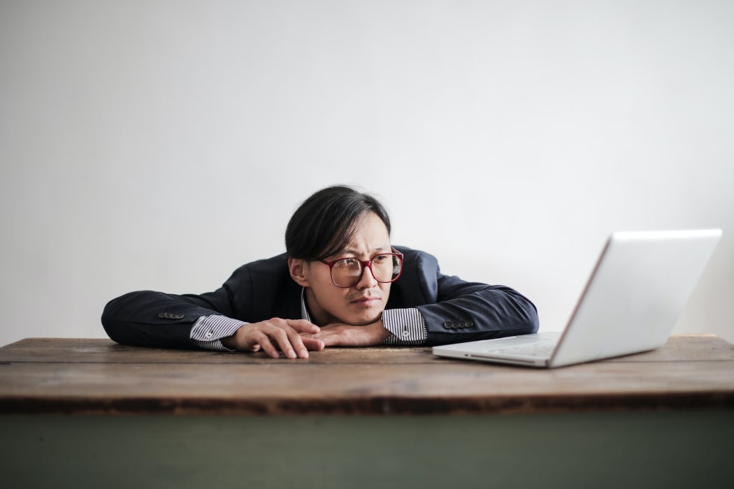 bored man on computer