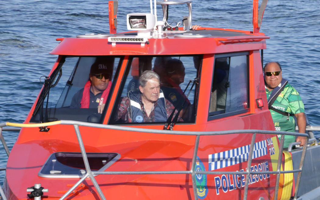 New Zealand foreign affairs minister Winston Peters goes for a spin in the search and rescue boat in Niue in July  2024.