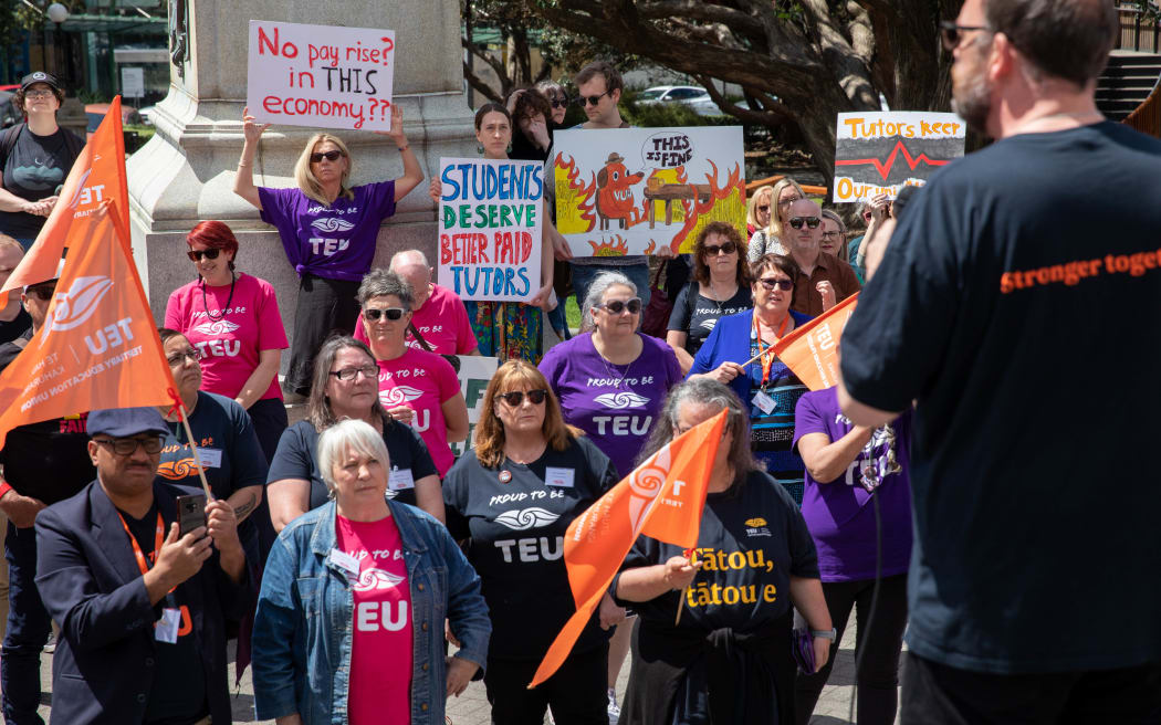 Members of the Tertiary Education Union protest outside Parliament