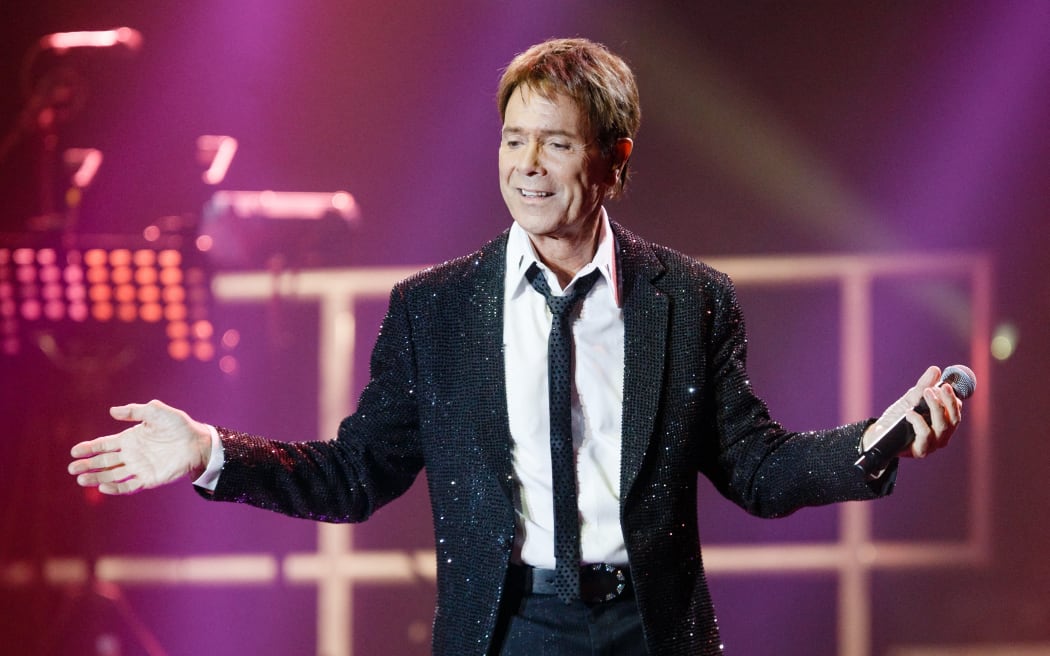 British singer Cliff Richard performs on stage during the first show of his European tour 'Still Reelin' And A-Rockin' at the o2-Arena concert venue in Hamburg, Germany, 13 May 2014.