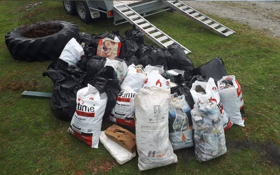 Bags filled with litter after volunteers helped with a cleanup today.