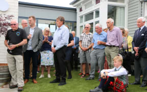 Hospital volunteers and guests gather in the hospital’s courtyard to celebrate the opening of the extension.