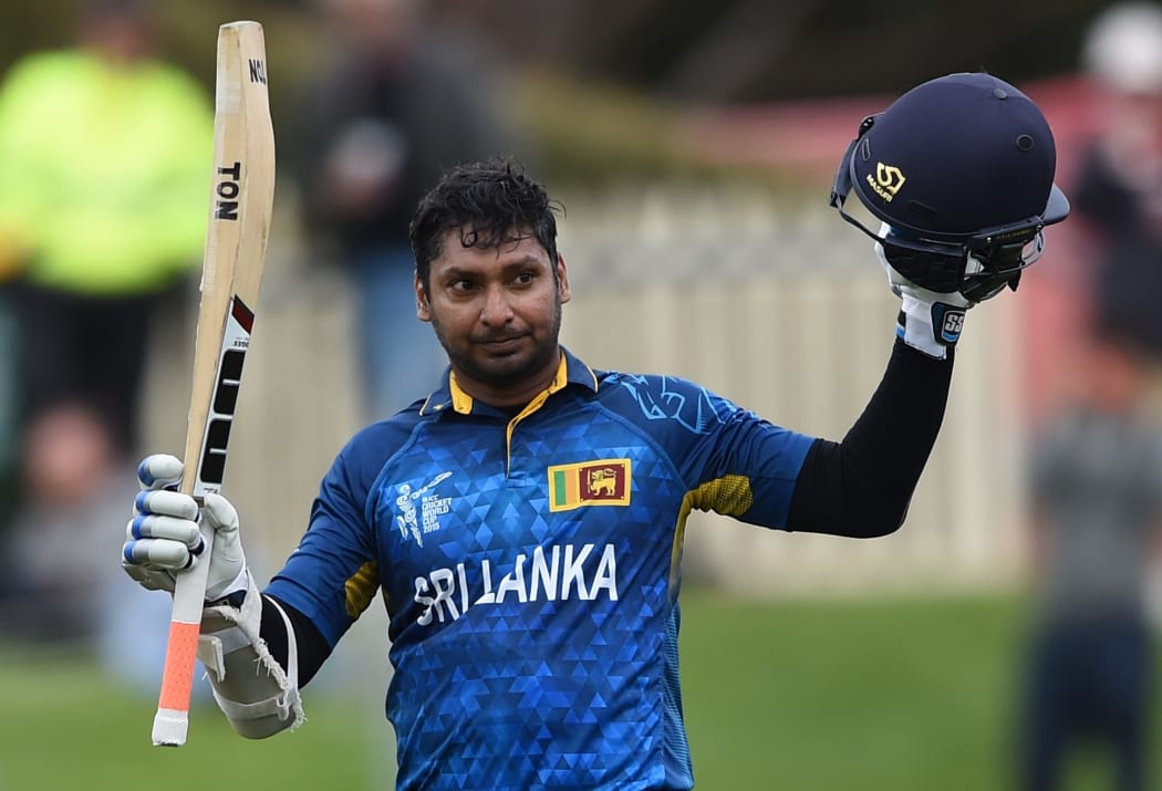 Sri Lanka batsman Kumar Sangakkara raises his bat after scoring a century at the Bellerive Oval.