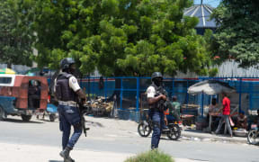 Haitian police patrol near Toussaint Louverture International Airport in Port-au-Prince, Haiti, on 12 August, 2024.