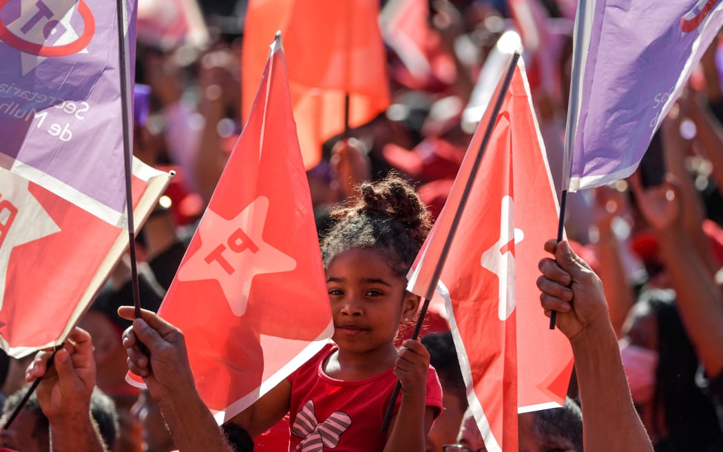 Supporters of Brazilian presidential pre-candidate for the leftist Workers Party (PT) attend a campaign rally in Diadema, Sao Paulo state.