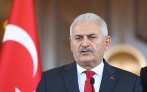 Turkish Prime Minister Binali Yildirim speaks to media at Cankaya Palace in Ankara, Turkey on July 16, 2016.