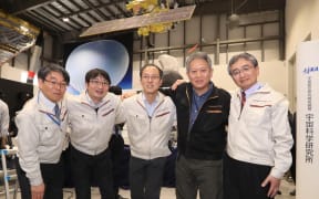 Takashi Kubota, research director of Institute of Space and Astornautical Science; Takanao Saeki, Hayabusa2 Project team engineer; Yuichi Tsuda, team manager; Fuyuto Terui, Hayabusa2 Project team member; and Makoto Yoshikawa, team mission manager.