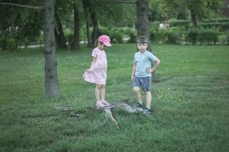 Two children playing outside.