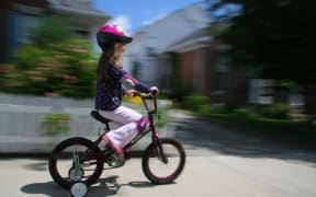Kid on bike