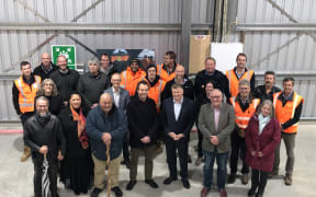 Vic Maggs (Wellington Water), Daren Courtnage, Cos Bruyn (Fulton Hogan), South Wairarapa Mayor Alex Beijen, Carterton Mayor Greg Lang, Rangitāne o Wairarapa cultural advisor Mike Kawana, and Rīhi and Te Rangikaiwhiria Reiri, of Hurunui o Rangi Marae, at the Ruamāhanga Roads [RR] depot in Carterton.