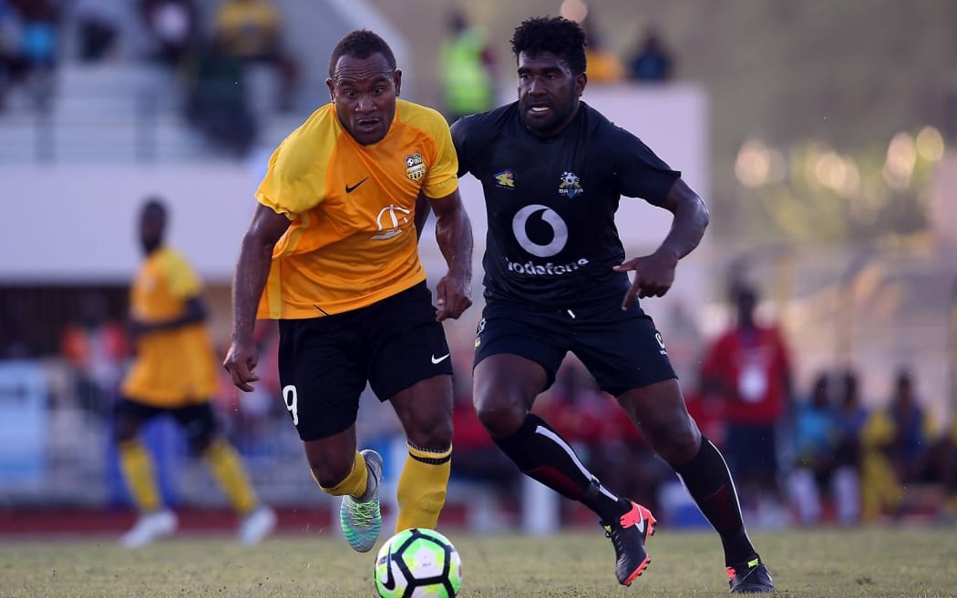 James Naka (L) and Nalkutan FC got the better of Fiji's Ba.