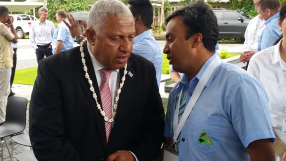 Fiji's PM Frank Bainimarama mingled with business people at the Fiji Australia Business Council forum at Pacific Harbour.