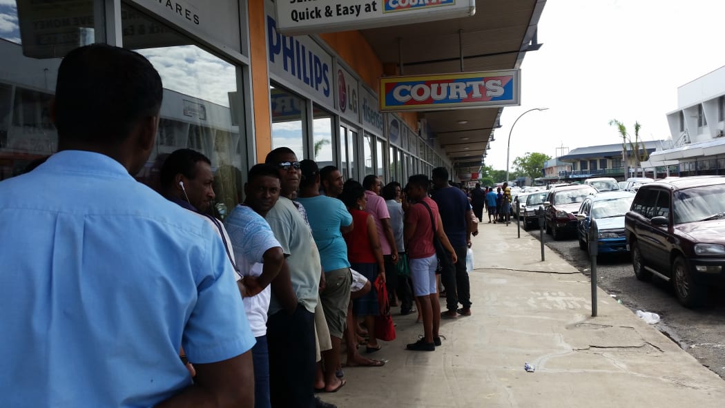 Fijians waiting for pension fund payouts to cope with cyclone aftermath