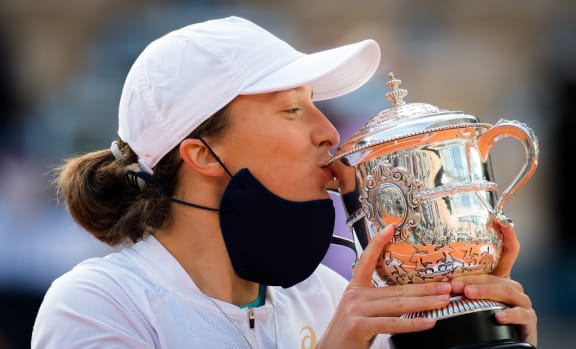 Iga Swiatek of Poland with the champions trophy after winning against Sofia Kenin of the United States the final of the Roland Garros 2020, Grand Slam tennis tournament, on October 10, 2020 at Roland Garros stadium in Paris, France