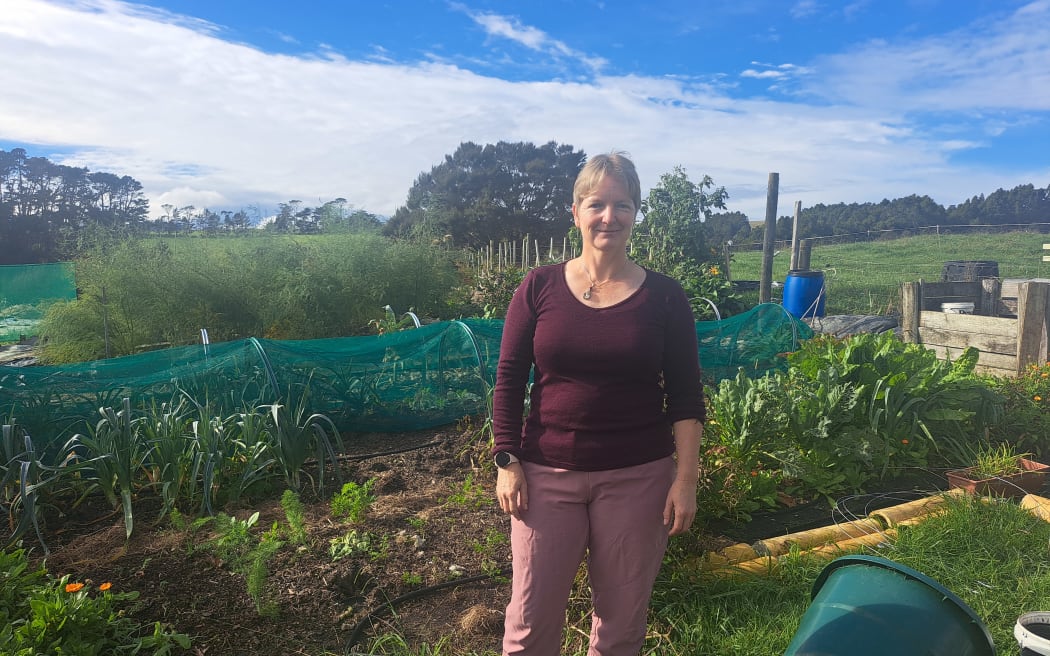 Pia Whittwer by her vege garden on her homestead near Warkworth.