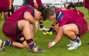 Dejected St Paul players after Kelston Boys High School v St Paul's College, Final - National Secondary Schools Rugby League Tournament. Auckland, September 2014.