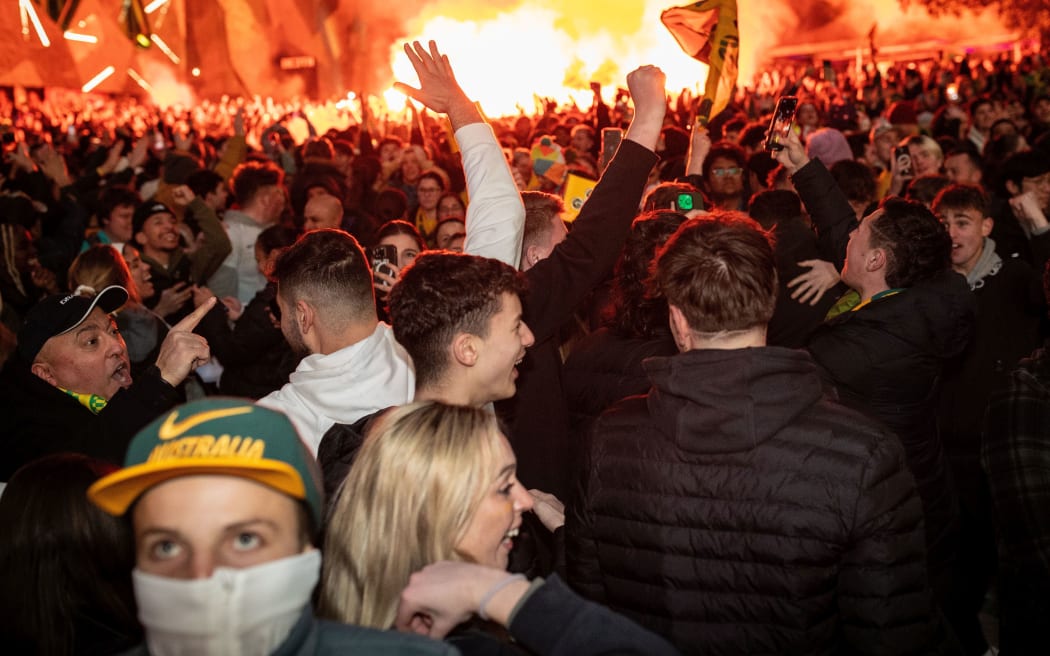 MELBOURNE, AUSTRALIA - AUGUST 16: Fans at Federation Square react after Australia scorers as they watch the Matildas FIFA World Cup Semi Final Game, on August 16, 2023 in Melbourne, Australia. (Photo by Darrian Traynor/Getty Images)