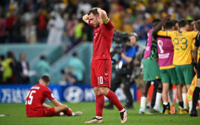 Denmark's midfielder #10 Christian Eriksen reacts after Australia won the Qatar 2022 World Cup Group D football match between Australia and Denmark at the Al-Janoub Stadium in Al-Wakrah, south of Doha on November 30, 2022. (Photo by Paul ELLIS / AFP)
