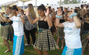 Students warm up for their performance at the Pasifika in the Bay Festival in the Bay of Plenty.