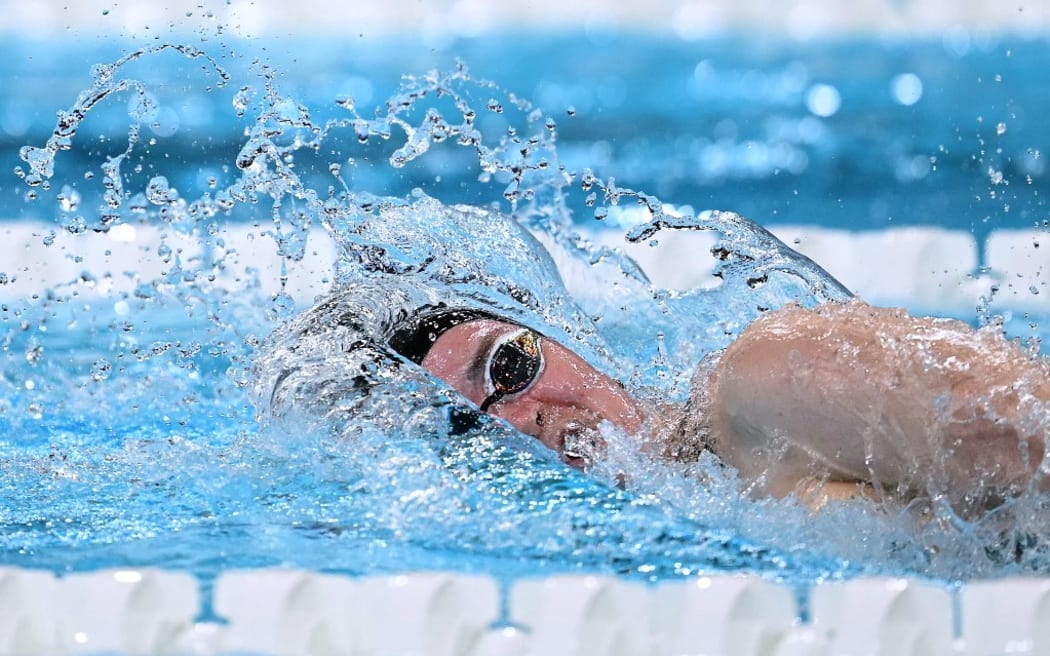 New Zealand's Erika Fairweather competes in  a heat of the women's 400m freestyle swimming event at the Paris 2024 Olympic Games at the Paris La Defense Arena in Nanterre, west of Paris, on July 27, 2024. (Photo by Jonathan NACKSTRAND / AFP)