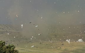 Debris flying around during the tornado that hit Alexandra on 17 December 2022.