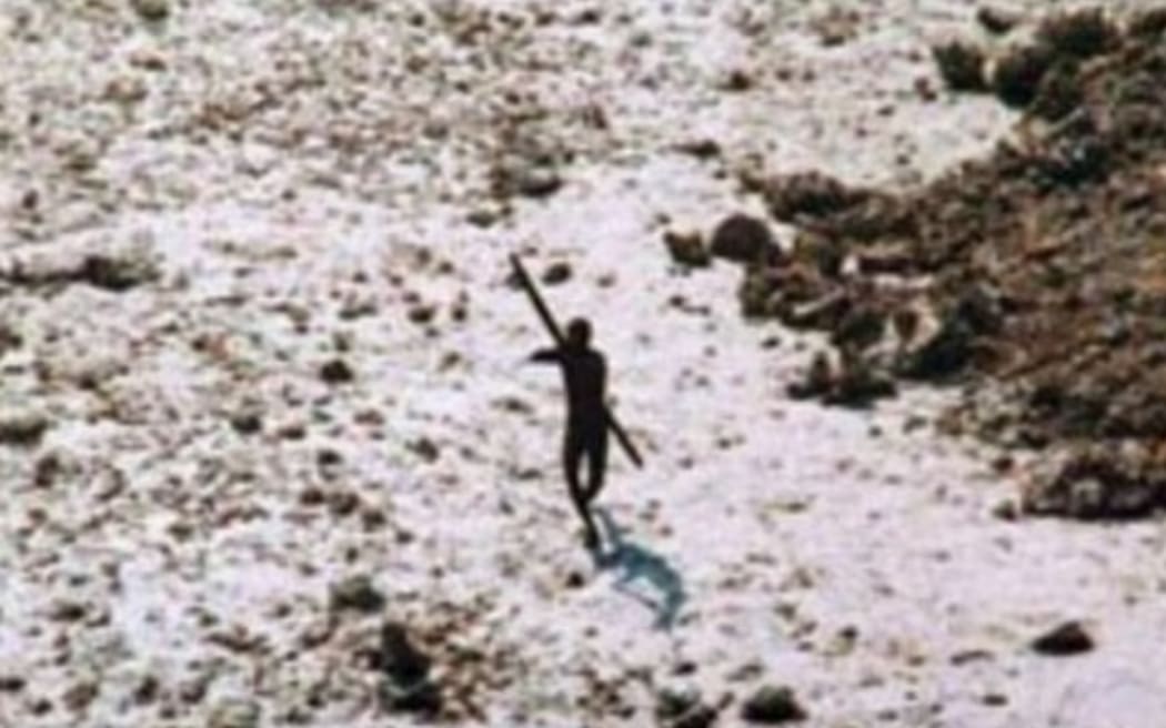 In the wake of the 2004 tsunami this member of the Sentinelese tribe was photographed firing arrows at a helicopter.