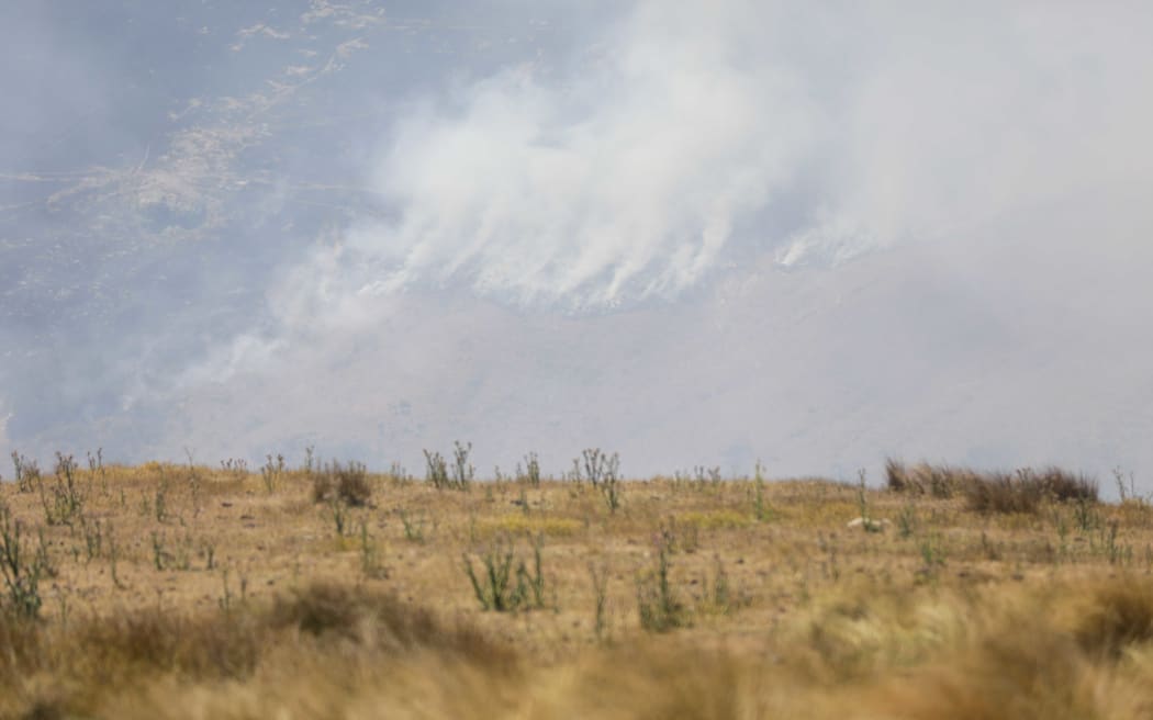 Smoke from a scrub fire on Christchurch's Port Hills on 15 December 2020.