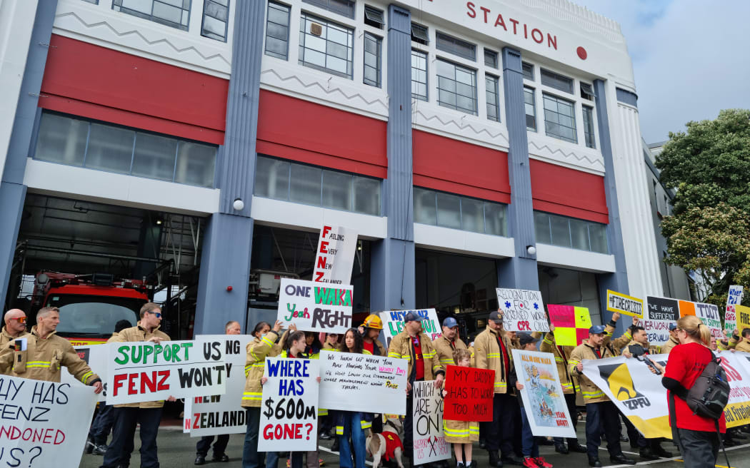 Firefighters on strike outside Auckland Central Fire Station.