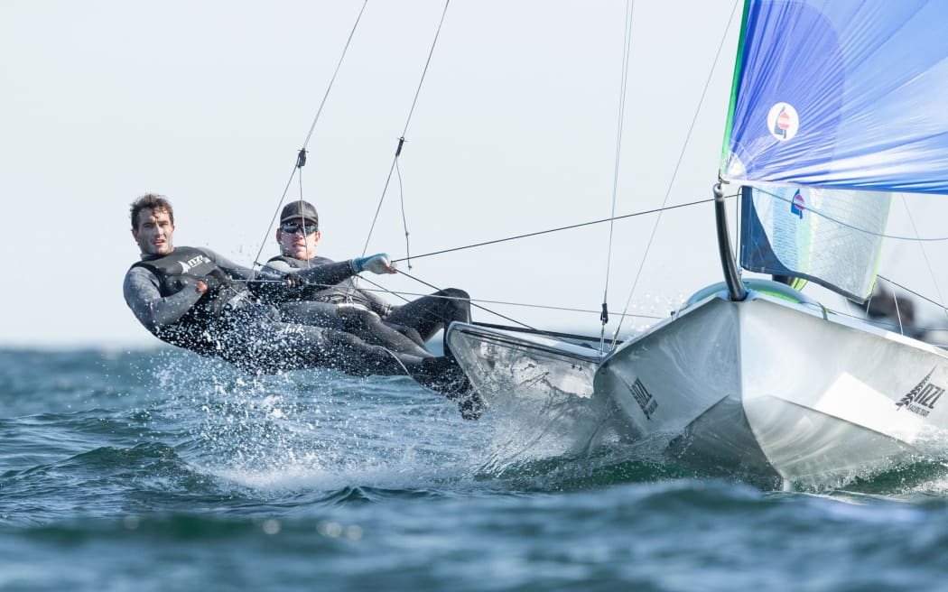 New Zealand sailors Peter Burling (R) and Blair Tuke (L).
