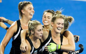 Black Sticks celebrate a Samantha Harrison goal.