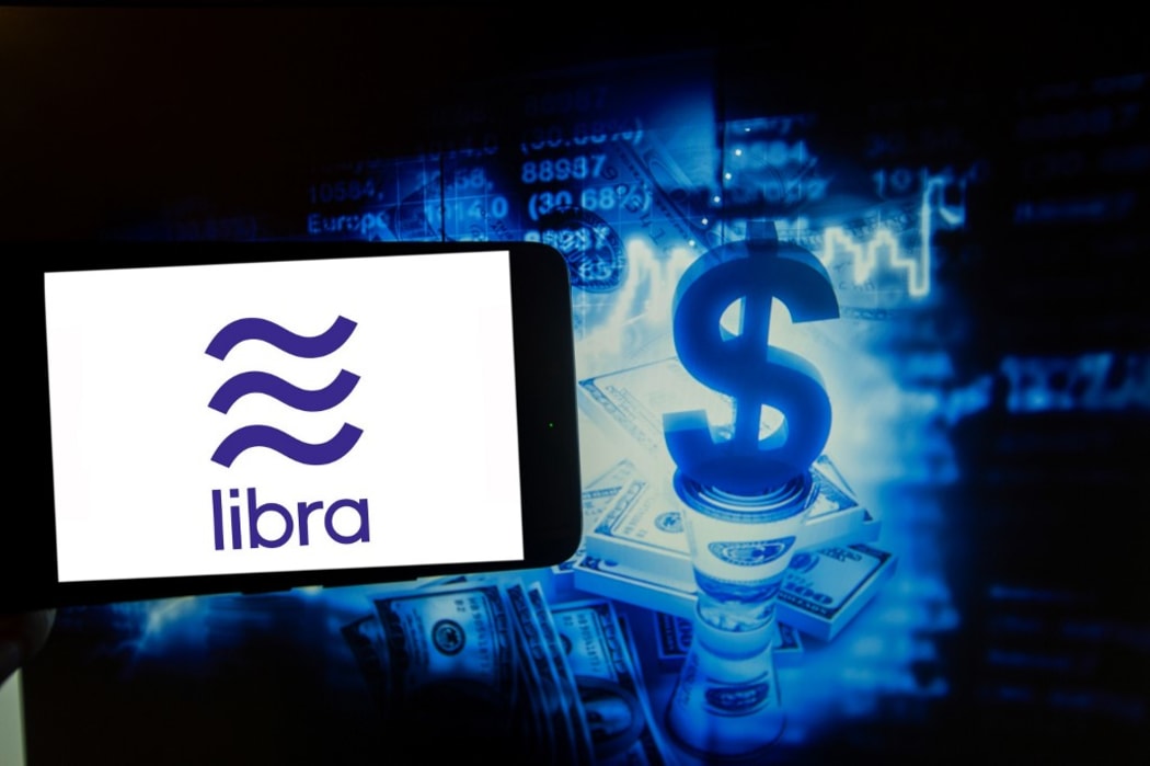 The logo of the digital currency Libra is seen in this photo illustration on the Digital Currencies. Libra is a crypto currency launched by Facebook. (Photo by Alexander Pohl/NurPhoto)