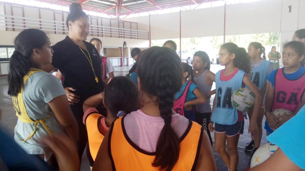 Former Samoa coach and captain Linda Vagana, running a netball clinic in Samoa for kids under 12.