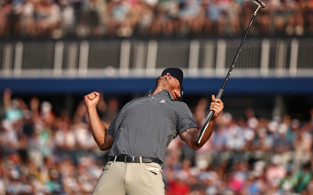 Bryson DeChambeau of the United States celebrates making a par on the 18th green to win during the final round of the 124th U.S. Open at Pinehurst Resort.