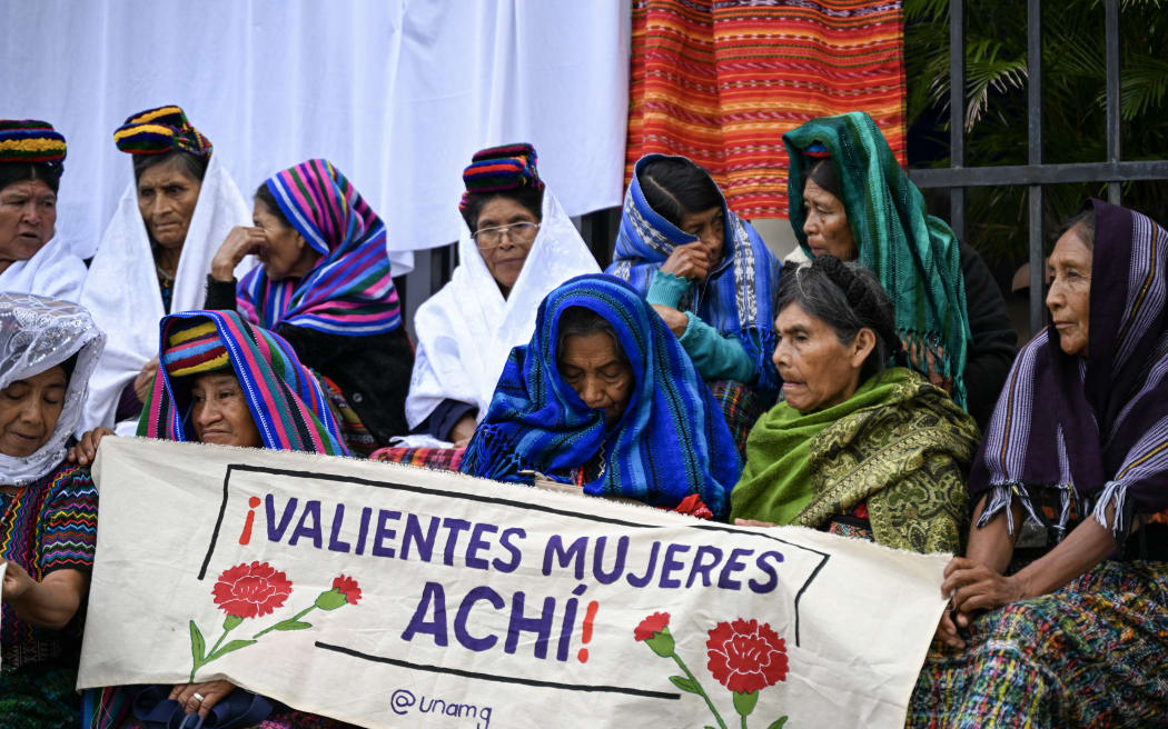 EDITORS NOTE: Graphic content / Guatemalan Achi Indigenous women, victims of sexual violence during the internal armed conflict (1960-1996), are seen outside the Justice Palace before the sentence against of three former paramilitaries accused of crimes of sexual violence against them, in Guatemala City on May 30, 2025. Former members of the Civil Self-Defence Patrols, created by the army, were part of the state repression that fought leftist guerrillas during the armed conflict that left 200,000 dead and disappeared, according to a UN commission that documented the atrocities. The trial began on 28 January and is the second for Achi women who were victims of multiple rapes in villages in the municipality of Rabinal and at an army base in the town, some 175 km north of the capital by road. (Photo by Johan ORDÓÑEZ / AFP)