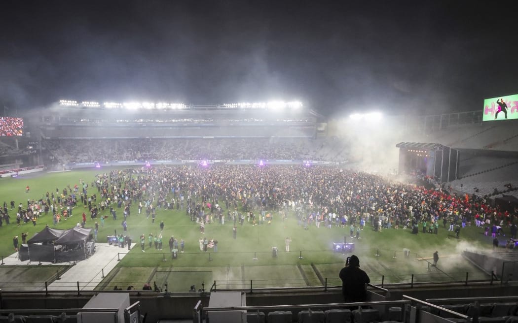 People take part in a world record attempt for the largest mass Haka at Eden Park in Auckland on September 29, 2024. The gathering on September 29 smashed the previous record, officially held by France since 2014, of the Maori war dance made famous by the All Blacks. (Photo by DJ Mills / AFP)