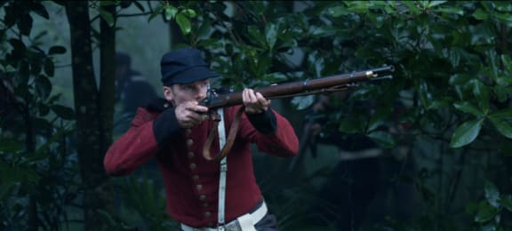 A British Soldier in the midst of an attack.