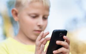 Brett Lee says it is crucial for parents to communicate with their children about what they are doing online.